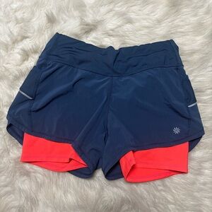 Athleta “Ready Set Go 2 in 1 Short” Navy and Orange Lined size women’s Small
